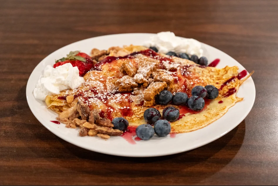 Berry Blast crepe with fresh blueberries, strawberries and whipped cream