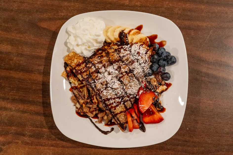 Deluxe crepe with banana, strawberries, blueberries and chocolate